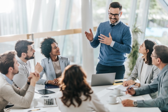 happy-manager-leads-a-meeting-in-the-office-640x427 happy-manager-leads-a-meeting-in-the-office-640x427